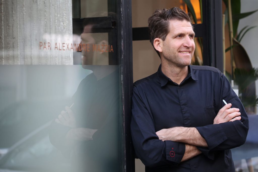 The chef Alexandre Mazzia of the restaurant AM by Alexandre Mazzia in Marseille was elected best chef of France by the guide Gault and Millau. Alexandre Mazzia offers lunch and dinner "travels" at prices ranging from 57 to 170 euros. His establishment, AM, 23 seats, is well hidden in a residential area where the customer only discovers the menu once at table in a minimalist decor and open to the kitchen on November 6, 2018 in Marseille, southern France. Le chef cuisinier Alexandre Mazzia du restaurant AM par Alexandre Mazzia a Marseille a ete elu meilleur cuisinier de France par le guide Gault et Millau. Alexandre Mazzia propose des Ç voyages È dejeuner et diner a des tarifs allant de 57 ˆ 170 euros. Son etablissement, AM, 23 couverts, est bien cache dans un quartier residentiel ou le client ne decouvre le menu qu'une fois a table dans un decor minimaliste et ouvert sur les cuisines a Marseille le 6 novembre 2018. //ALAINROBERT_ROBERT01768/Credit:Alain ROBERT/SIPA/1811070856