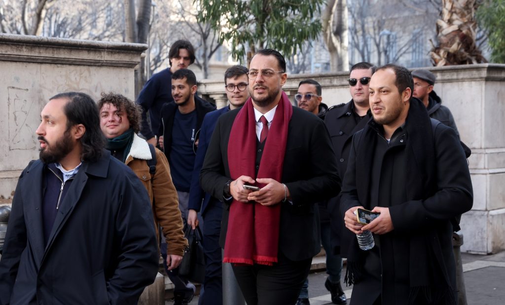 ebastien Delogu and Younes Taguelmint. La France Insoumise (LFI) - Nouveau Front Populaire group s MP Sebastien Delogu arrives for his trial at the Marseille Justice palace. Delogu is on trial on January 7, 2025, for violence during the blockade of a high school in Marseille, during a social movement against France s pension reform in Marseille, southern France, on January 7, 2025. La France Insoumise (LFI) - Le depute du Nouveau Front Populaire Sebastien Delogu arrive a son proces au palais de justice de Marseille. Sebastien Delogu est juge le 7 janvier 2025 pour des violences commises lors du blocage d un lycee a Marseille, lors d un mouvement social contre la reforme des retraites a Marseille mardi 7 janvier 2025.